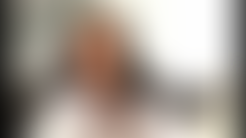 Blurred content preview