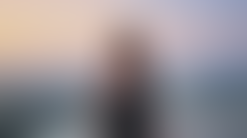 Blurred content preview