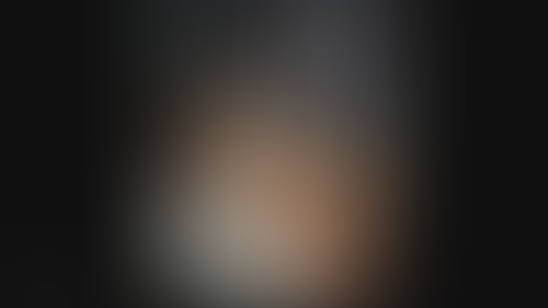 Blurred content preview