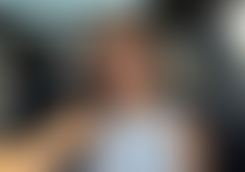 Blurred content preview